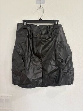 Stillwater NWT black faux leather cargo mini skirt.